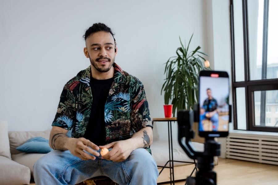 Content creator recording short-form video in modern studio setup